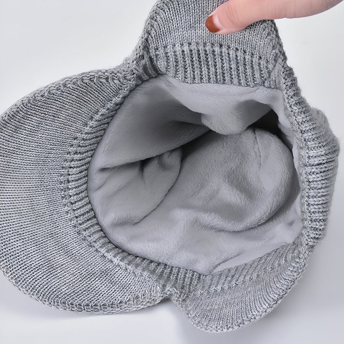 Bonnet d’hiver tricoté avec cache-oreilles et visière | Montevall - Montevall