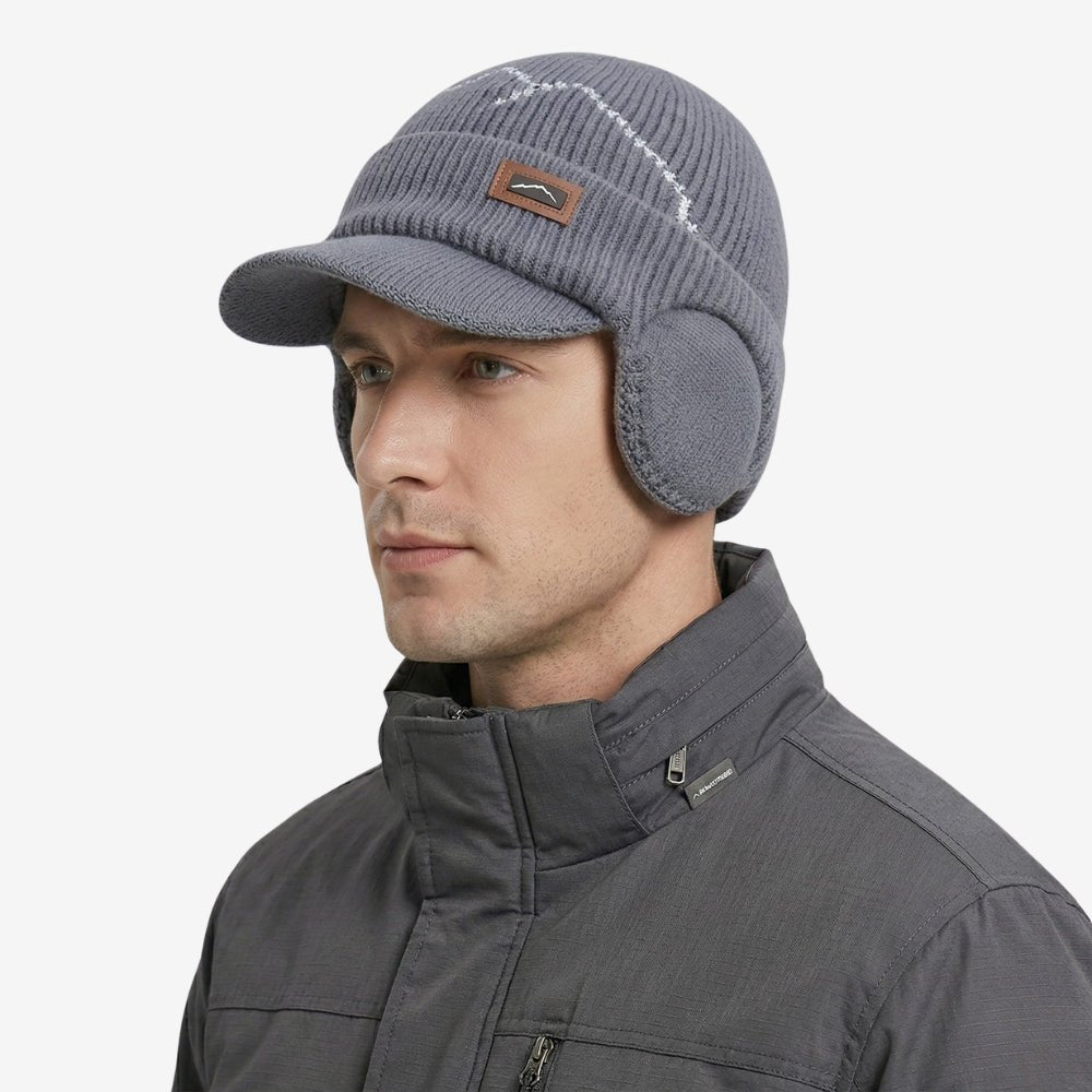 Bonnet d’hiver tricoté avec cache-oreilles et visière | Montevall - Montevall